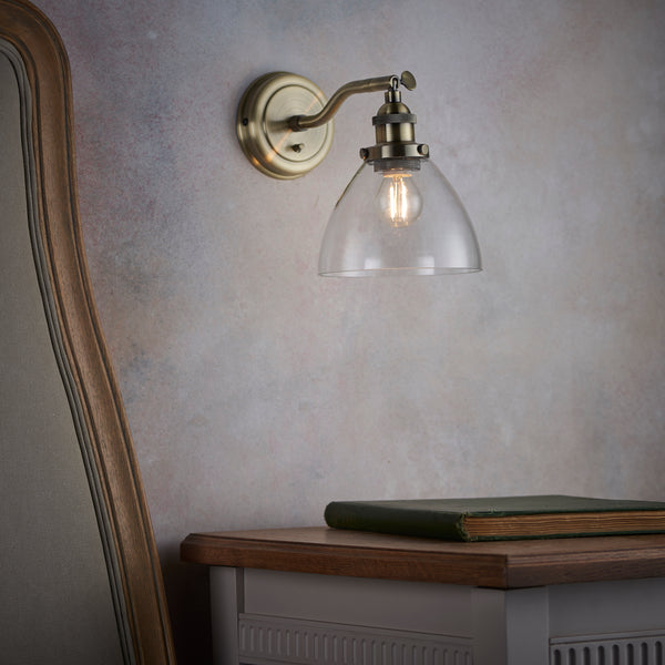 Hansen Wall Light in Antique Brass with Clear Glass Shade