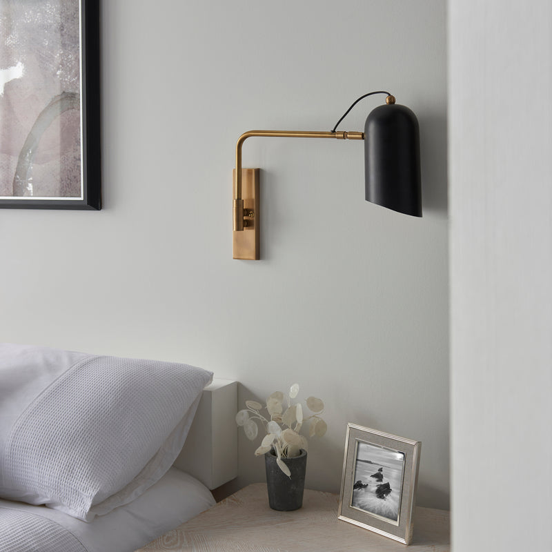 Navren Swing Arm Wall Light in Antique Brass & Matte Black Shade